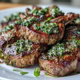Lamb chops with mint gremolata, grilled to perfection and topped with fresh herb-lemon zest. Juicy, aromatic, and ideal for an elegant dinner.