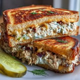 Grill marks show this classic crispy tuna melt, ready to enjoy warm.