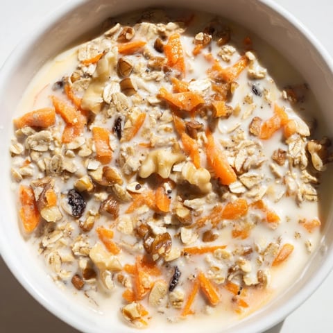 Creamy Carrot Cake Overnight Oats, layered with grated carrots and warm spices, ready to chill overnight.