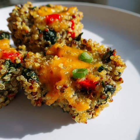 These delicious Baked Cheddar Quinoa Bites feature fluffy quinoa and melted cheddar in every bite.
