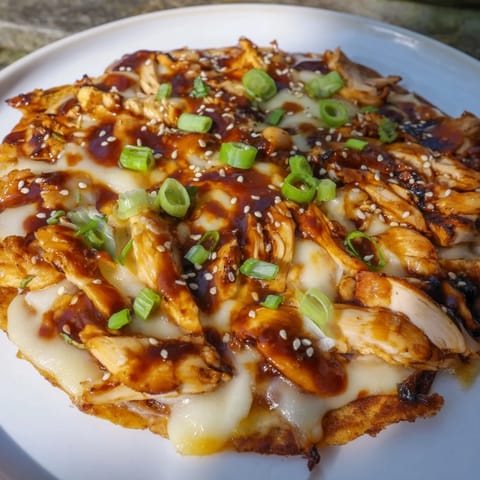 Crispy grilled Korean BBQ Chicken Wrap Grilled Cheese, a perfect blend of Korean flavors and comfort food.