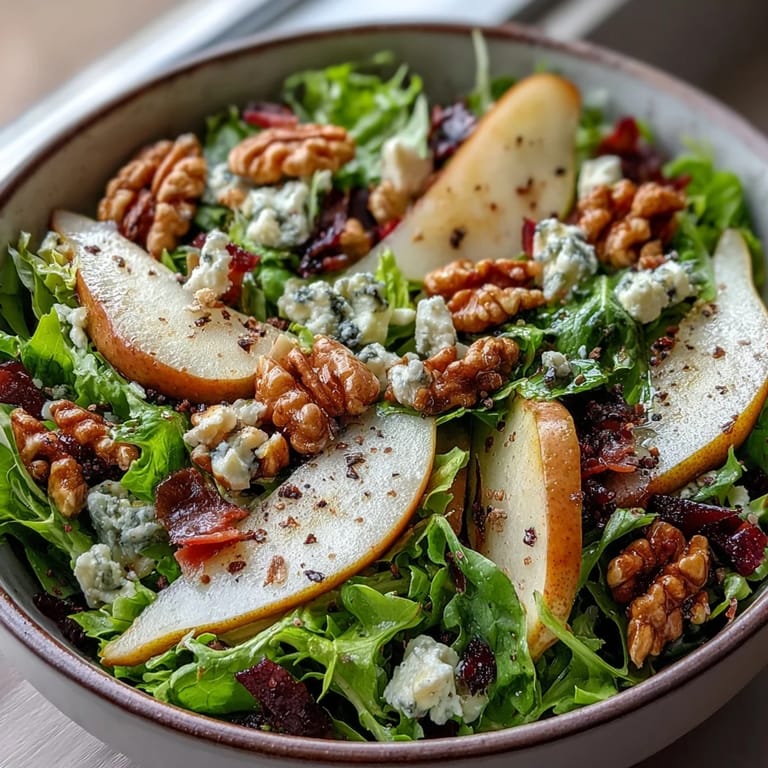 Mixed greens tossed with walnuts and vinaigrette, served as a vibrant gluten-free salad.